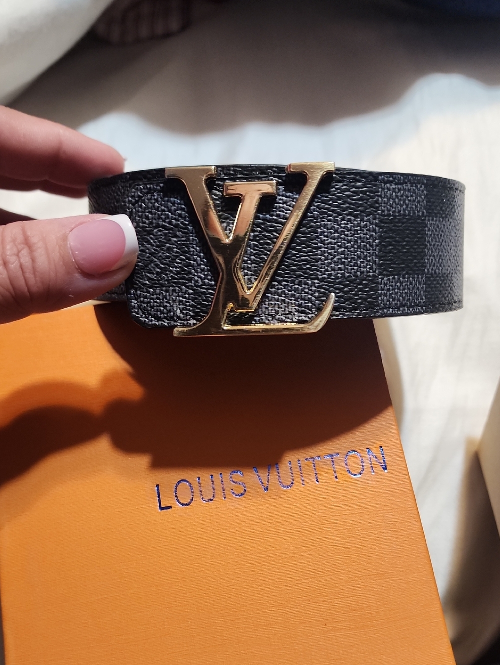 Louis Vuitton Black with Gold LV Buckle